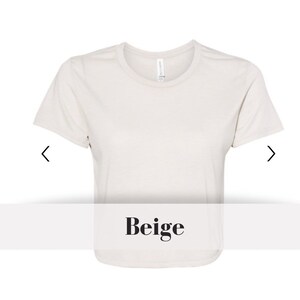 May include: A beige short-sleeved t-shirt with a crew neck.