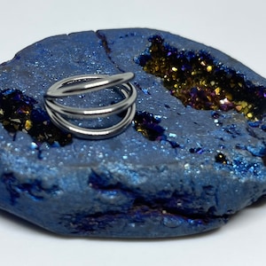 16 gauge 5/16 triple ring (spaced apart) titanium clicker