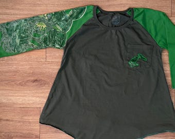 Upcycled shirt with psychedelic drum kit and crows. Price includes donation to charity.