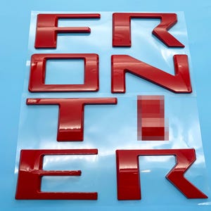 Tailgate Raised Letters For Nissan Frontier 2022-2025 – Red Outline, Gloss Black, Self-Adhesive, Made In USA