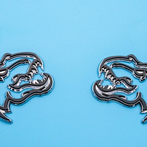 Black on Chrome Double Layer Dinosaur Fender Badges | Aggressive Raptor Design for F150, RAM 1500, and More | 2 Premium Badges