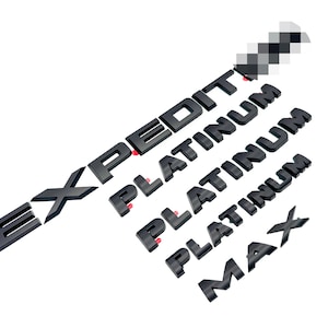 May include: Black 3D lettering spelling out "EXPEDITION" followed by "PLATINUM" repeated three times and ending with "MAX".