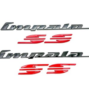 May include: Two sets of Impala SS emblems. The Impala text is in a glossy black finish, and the SS emblems are in red. The emblems are designed for automotive use and are displayed against a white background.