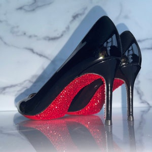 The True Story Of How Christian Louboutin Shoes Got Those Trademark Red  Soles