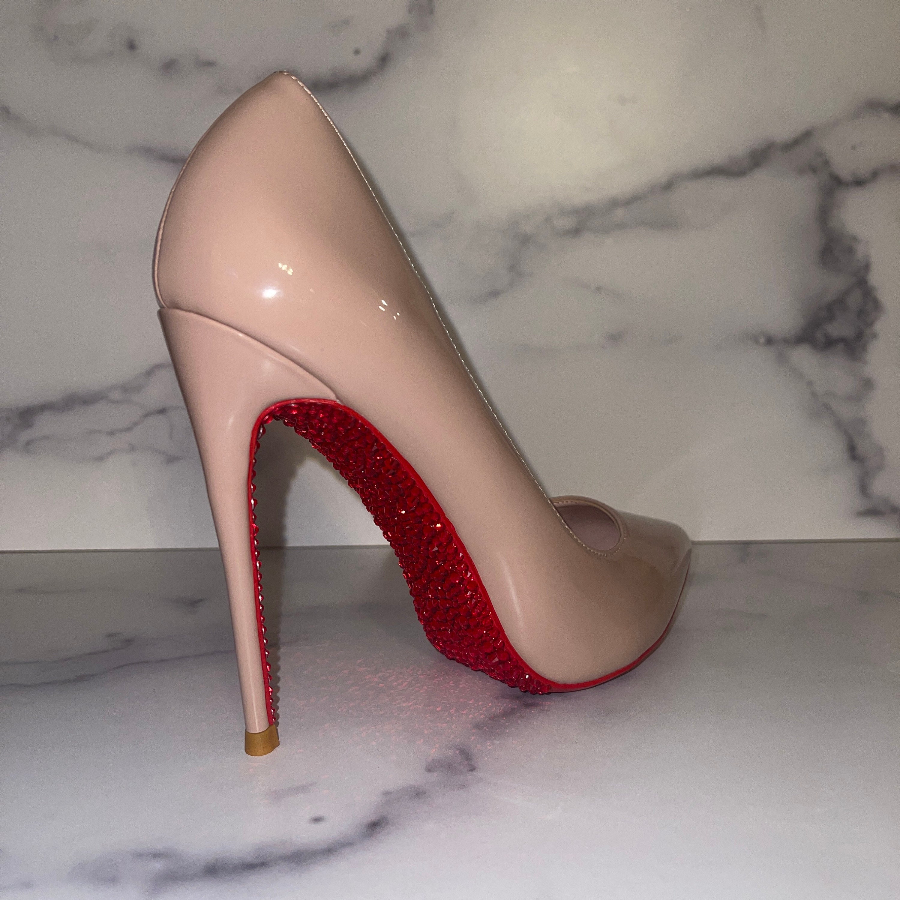 Nude heels red sole discount