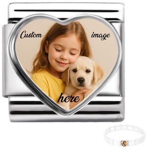 May include: A silver charm featuring a heart-shaped photo of a girl and a puppy, with the text "Custom image here". A white bracelet with a small photo charm is also shown.