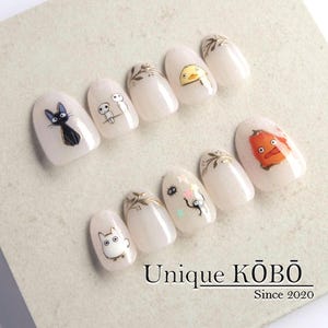 Kawaii Anime Press-On Nails: Hand-Painted Pink Fantasy Character Design