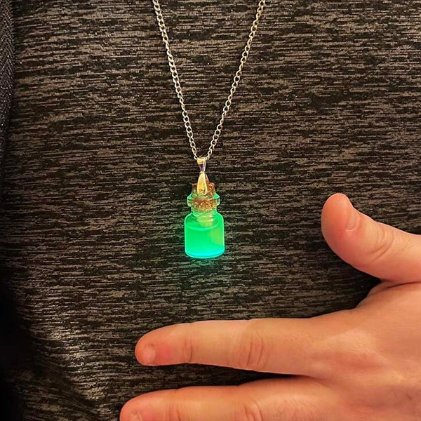 Glowing Specimen Bottle Necklace: glow-in-the-dark fluorescent bottles with real bones and moss