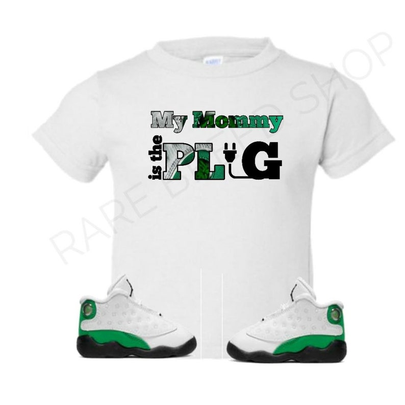 green and white jordan 13 shirt