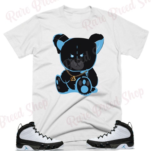 university blue jordan 9 shirt