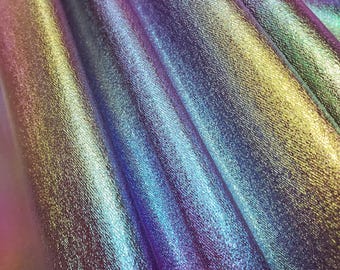 Iridescent Oil Slick Stretch Tissue Foil Fabric 60" By The Yard On Purple Knit Fabric