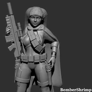 May include: A gray 3D printed figurine of a female character wearing a hooded cloak, a belt with pouches, and boots. She is holding a rifle in her right hand and a pistol in her left hand. The figurine is standing on a gray background. The text "BomberShrimp Artwork" is visible in the lower right corner of the image.