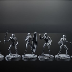 May include: A set of ten 3D printed miniature figures of robots, each with a different weapon or tool. The figures are painted in a metallic gray color and are posed in various action stances. The figures are displayed on a black background.