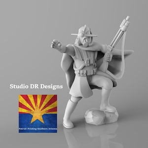 May include: A white 3D printed miniature of a character wearing a hooded cloak and holding a rifle. The character has a gas mask and a helmet with a visor. The miniature is standing on a rock base. The image also includes a logo for Studio DR Designs and a flag of Arizona.