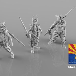 May include: Three gray 3D printed miniature figures of humanoid characters wearing futuristic armor and helmets. The figures are holding weapons and are posed in action stances. The figures are set against a gray background.