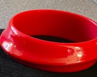 Red plastic bangle bracelet