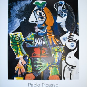 May include: A colorful abstract painting by Pablo Picasso featuring two figures. The figure on the left is a man with a green, yellow, and red costume. The figure on the right is a woman with a white body and black hair. The background is black.