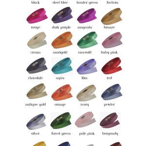 May include: A collection of ribbon spools in various colors, including black, steel blue, hunter green, fuchsia, rouge, dark purple, magenta, bronze, cream, marigold, emerald, baby pink, chocolate, aqua, lilac, red, antique gold, orange, ivory, pewter, silver, forest green, pale pink, burgundy, daffodil, navy blue, bridal white, and russet.