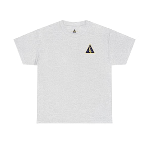 May include: A heather grey t-shirt with a small, yellow triangle logo featuring a stylized figure inside. The triangle has a yellow outline and a navy blue interior.