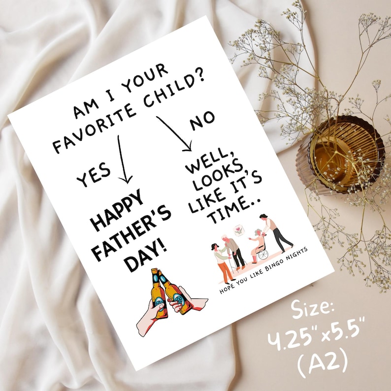 May include: A humorous Father's Day card with a flow chart asking "Am I your favorite child?" with the answer "Yes" leading to "Happy Father's Day!" and the answer "No" leading to "Well, looks like it's time..." with a cartoon image of a family with an elderly couple and a person in a wheelchair. The card is 4.25 inches by 5.5 inches.