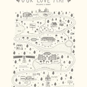 May include: A black and white illustrated map titled "OUR LOVE MAP" with the names "Melanie & Bobby" above. The map features various locations, including New York City, Florida, and the Bahamas, with detailed drawings of buildings and landmarks.