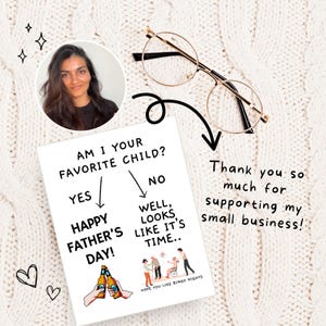 May include: A white card with a humorous Father's Day message. The card features a choice between "Yes" and "No" with the text "Am I your favorite child?"  The "Yes" option leads to "Happy Father's Day!" and the "No" option leads to "Well, looks like it's time..." with a cartoon image of a father sitting in a wheelchair with two people standing next to him. The card also includes the text "Hope you like bingo nights".