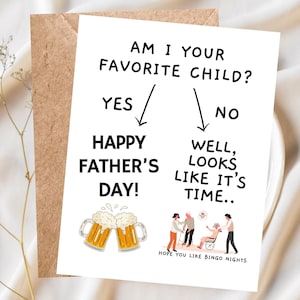 May include: A humorous Father's Day card with a flow chart asking "Am I your favorite child?" with the answers "Yes" leading to "Happy Father's Day!" and "No" leading to "Well, looks like it's time..." with a cartoon image of a family with an elderly man in a wheelchair. The text at the bottom reads "Hope you like bingo nights."