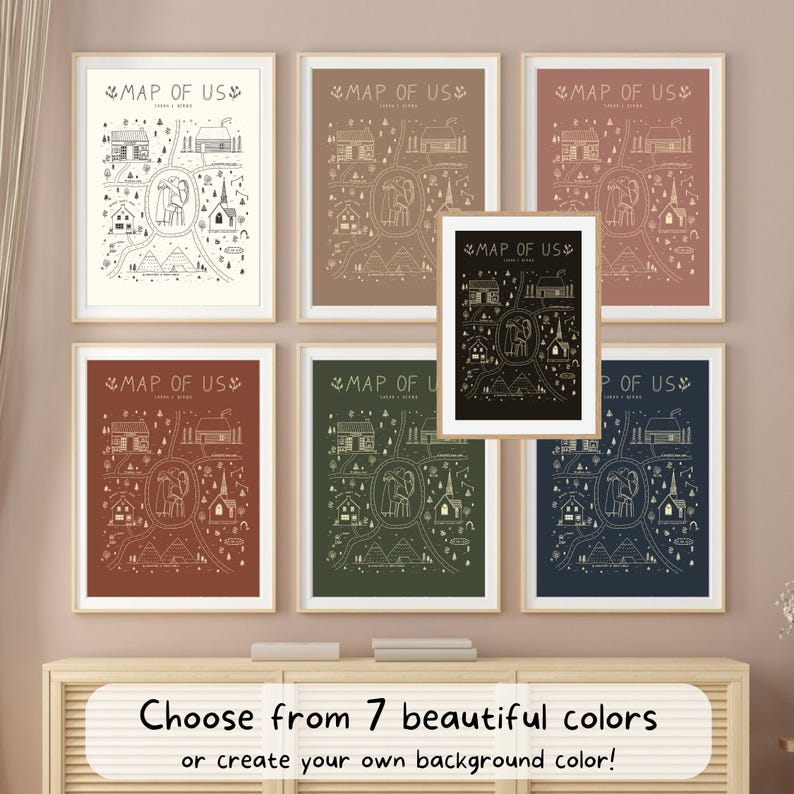 May include: Seven framed prints with a map design in various colors, including beige, brown, and navy. Each print features a detailed illustration of a landscape with the text "MAP OF US". The bottom of the image has text that reads "Choose from 7 beautiful colors or create your own background color!"