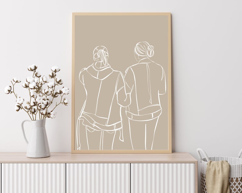 May include: A line drawing of two people standing back to back, with their hair pulled back. The drawing is in white on a beige background.