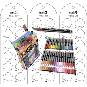 May include: A set of 36 acrylic paint pens in earth tones, presented with colour swatches. The pens are in a box labelled "36 Earth Tones" and "Tooli-Art." Additional pens are shown, along with a single pen labelled "Acrylic Paint Pen."