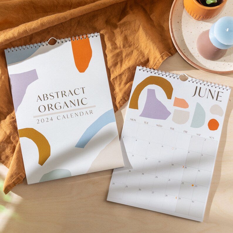 2024 A4 Calendar - abstract, organic designs on each monthly page. 100% Recycled Paper, Made in the UK. Includes week number and moon phases.