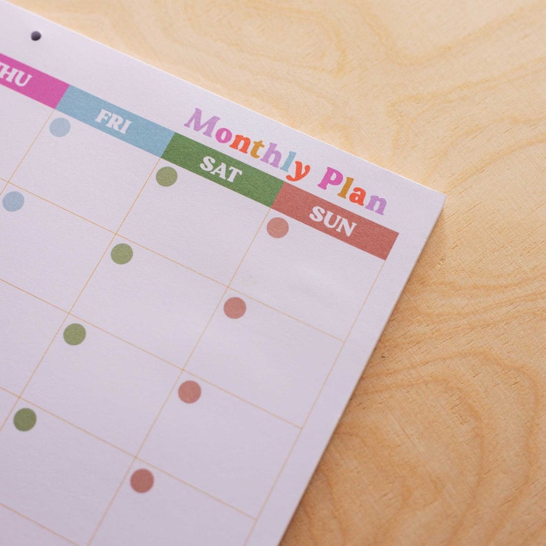 a4 monthly planner pad. use for fitness, school, work and family life. 52 pages. 100% recycled paper. made in the UK.