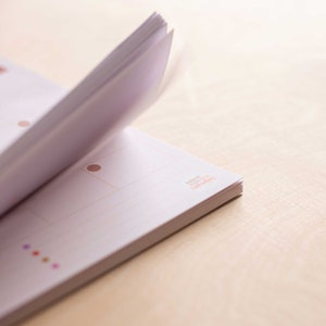 a4 monthly planner pad. use for fitness, school, work and family life. 52 pages. 100% recycled paper. made in the UK.