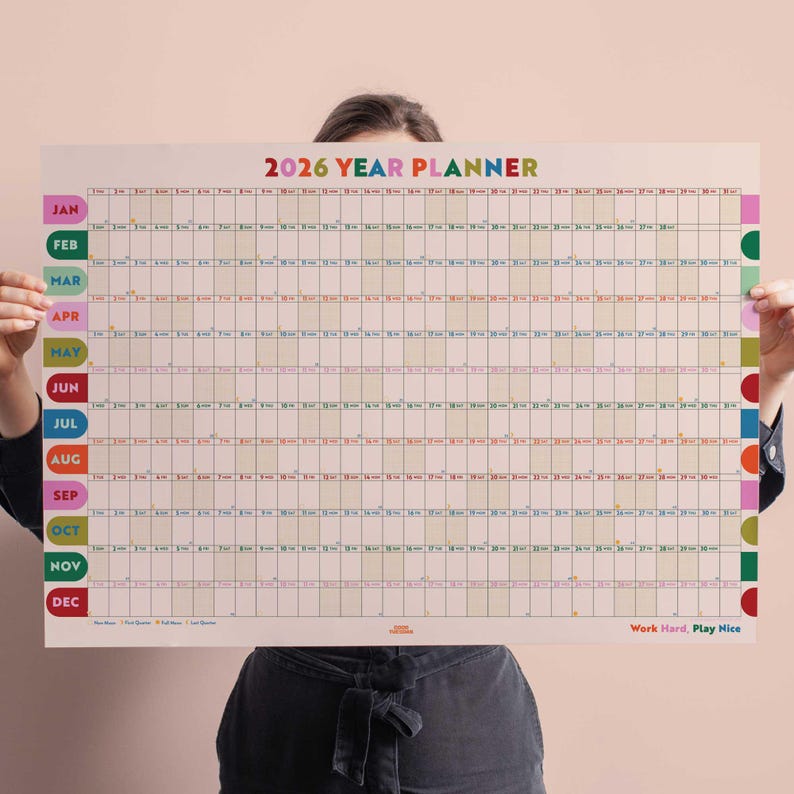 2026 year-at-a-glance wall planner in Play Nice Arches design. Annual Wall Planner is Landscape format. Colourful Art design.