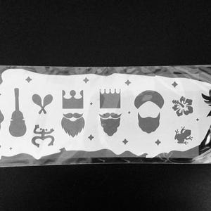 Puerto Rico map template with the three wise men, Puerto Rican cuatro, maracas, coquí, Taíno coquí, maga flower, and Puerto Rican parrot.