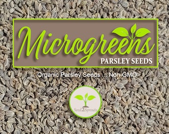 May include: Close-up of a pile of small, dark brown and light gray parsley seeds. The text "Microgreens Parsley Seeds Organic Parsley Seeds... Non-GMO" is on a brown rectangle with green leaves. The text "Seed2Sprouts" is on a white circle with green leaves.