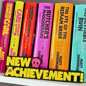 May include: A collection of colorful books titled "Dungeon Crawler Carl" with various sub-titles. The spines are in shades of pink, yellow, red, purple, orange, and teal. A yellow and black sign that says "NEW ACHIEVEMENT!" is in front of the books.