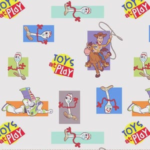 May include: A light gray fabric featuring a repeating pattern of Toy Story characters including Forky, Woody riding Bullseye with a lasso, and Buzz Lightyear. The design includes the text TOYS at Play in colorful, stylized lettering on backgrounds.