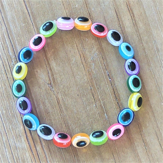 Bracelet élastique Perles Noires Ovales - Bijou Fantaisie Simple Et Efficace, Neuf Sans Emballage