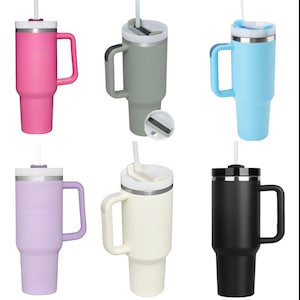 May include: Six stainless steel travel mugs with handles and lids. The mugs are in various colors, including pink, green, blue, purple, white, and black.