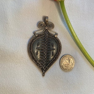 Sterling silver tribal art pendants