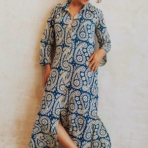 Chic beach coverup shirt dress. Sold in upscale boutiques for 180/- Our price 54/- Small, medium