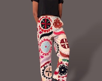 Hand embroidered boho suzani unisex pants. Garment waist 30-36in. Garment hip 42 in. Club dance festival weekend