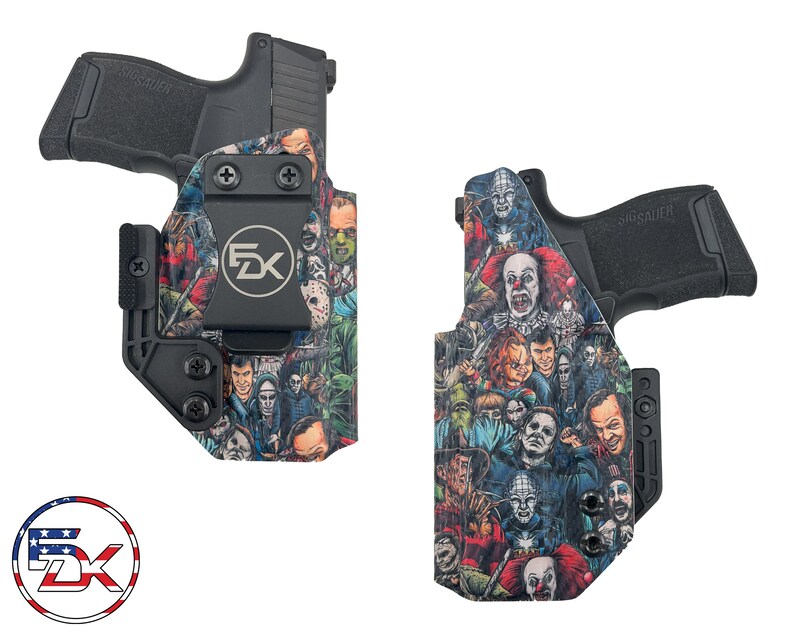 May include: Two black gun holsters with a colorful horror movie character print. The print features characters like Freddy Krueger, Jason Voorhees, and Michael Myers.