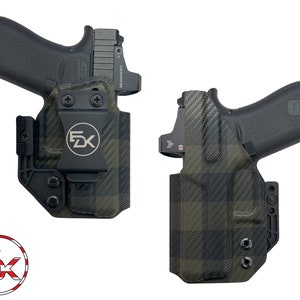 May include: Two black and green checkered holsters for a handgun with a red dot sight. The holsters have a black clip and a black logo that says "FDX".