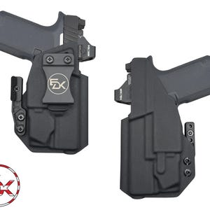 May include: Two black gun holsters with a grey handgun. The holsters have a clip and the logo "FX" on the front. The handgun has a red dot sight. The image also includes a logo with the letters "FX" inside a circle with red, white, and blue stripes.