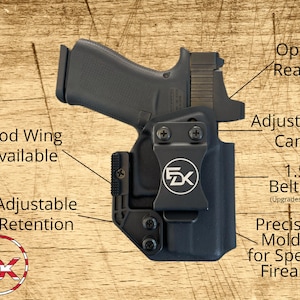 a black gun holster with various features and accessories, including a Mod Wing, Adjustable Retention, 1.5" Belt Clip, and Precision Molded for Specific Firearm.