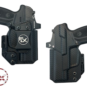 May include: A black carbon fiber holster with a black gun inside. The holster has a black clip and a black logo that says "5DX".