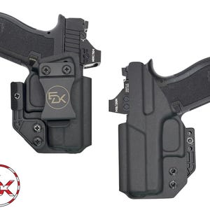 May include: Two black holsters for handguns with adjustable clips and a black and gold logo on the front of one holster.