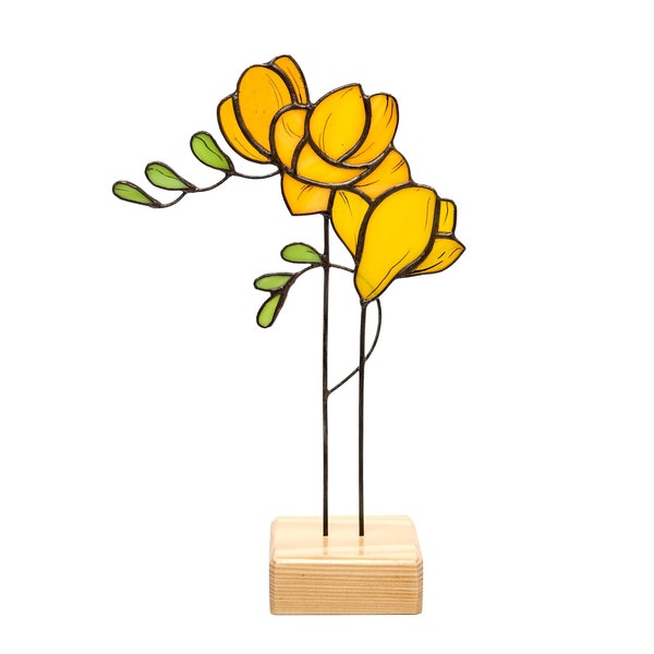 Support de fleurs Freesia en vitrail avec dessus de table cadeau en bois sur le décor de bureau en bois